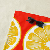 Serviette de plage jaune orange tranche de citron (En situation)