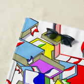 serviette de plage "L'ÉCOLE EST OUT POUR L'ÉTÉ". (En situation)