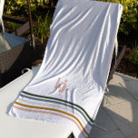 Serviette De Plage Monogramme à rayures rétro chic<br><div class="desc">Un design minimaliste monogramme avec de grandes initiales typographiques dans une police classique avec votre nom ci-dessous et des rayures chic rétro couleur arc-en-ciel. L'été est le moment idéal pour ajouter des pops audacieux de couleur joyeuse, et avec cette palette, votre journée d'été sur la plage sera remplie de sourires...</div>