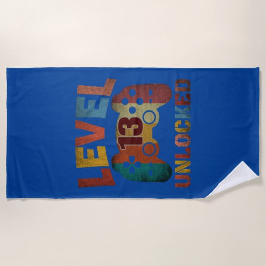 SERVIETTE DE PLAGE NIVEAU 13 DÉBLOQUÉ (Devant)