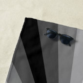 Serviette de plage noire à illusion d'optique (En situation)