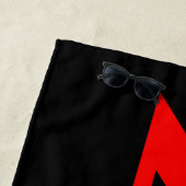 Serviette de plage noire rouge zen (En situation)