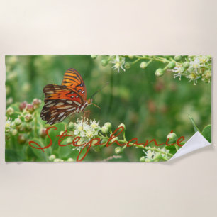 Serviette de plage orange de papillon avec le nom