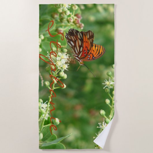 Serviette de plage orange de papillon avec le nom (Devant)