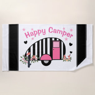 Serviette de plage rayée heureuse de campeur