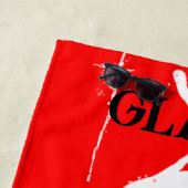 Serviette de plage rouge A.O.N.G. (En situation)