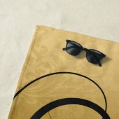 Serviette De Plage Tourbillon floral or et noir (En situation)