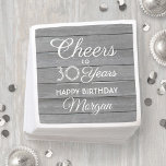 Serviette En Papier ANY Birthday Cheers Rustic Wood Elegant Gray White<br><div class="desc">Add an elegant personalized touch to birthday party decorations with these stylish faux grey wood paper napkins. Design features modern script calligraphy editable "Cheers to 30 Years" on a rustic gray wood look background. This template is set up for a 30th birthday celebration, but is simple to customize to a...</div>