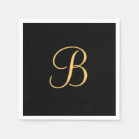 B de couleur or sur noir