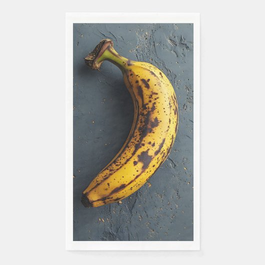 Serviette En Papier Banane exotique posée sur une surface grise (Devant)