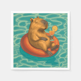 Serviette En Papier Capylara cocktail sur bouée à la piscine