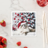 Serviette En Papier Chat à poupée de Noël dans un chapeau de Père Noël (En situation)
