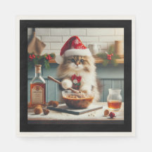 Chat duveteux préparant un pudding de Noël alcooli