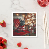 Serviette En Papier Chien de taureau noir de Noël sur une chaise rouge (En situation)