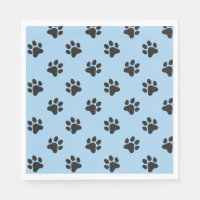 Chien noir mignon empreinte de patte bleu