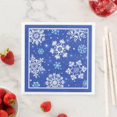 Serviette En Papier Flocons blancs sur fond bleu (En situation)