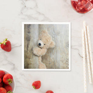 Serviette En Papier Ours farci mignon Fond en bois rustique