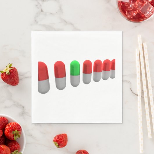 Serviette En Papier Pilule verte unique parmi les capsules rouges (En situation)