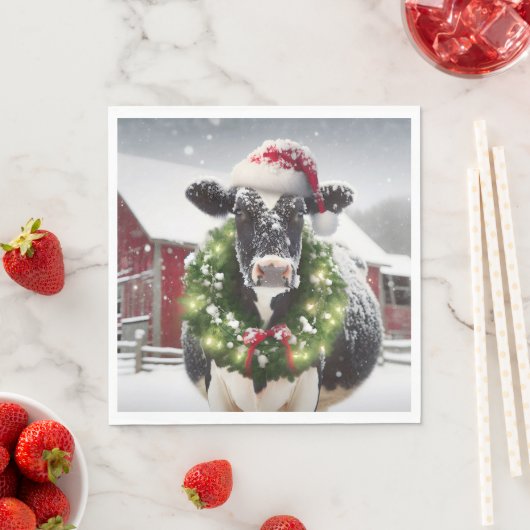 Serviette En Papier Vache de Noël portant une couronne (En situation)