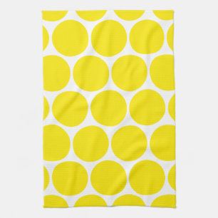Serviettes blanches et jaunes de motif de pois