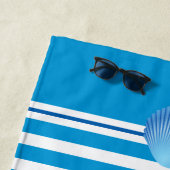 Serviettes de plage et coquilles (En situation)
