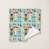 Serviettes et gant de toilette présentent un motif (Gant de toilette)