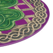 Shamrock violet sur la planche à découper des noeu (Coin)