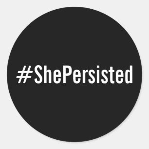 #ShePersisted, witte tekst op zwarte stickers