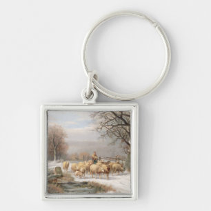 Shepherdess met haar kudde in een winterlandschap sleutelhanger