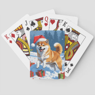 Shiba Inu hardlopen in de sneeuw met kerstmuts Pokerkaarten