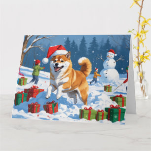 Shiba Inu loopt in de sneeuw met kerstmuts Kaart