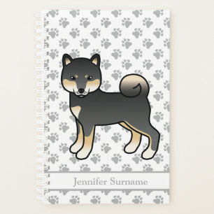 Shiba Inu noir et fauve Chien mignon et pattes & T