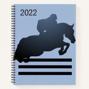 Show jumper die een obstakel kan wegnemen notitieboek