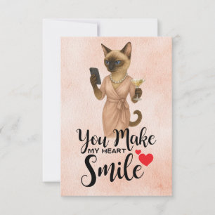 Siamese kat kijkt naar mobieltje bedankkaart
