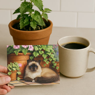 Siamese kat ligt bij bloemen kattenliefhebber  briefkaart