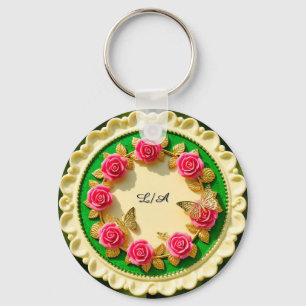 Siergroene randplaat met roze roos sleutelhanger