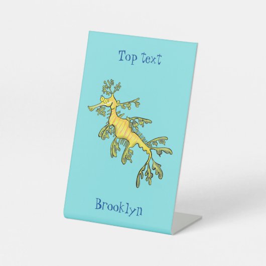 Signe De Table Caricature amusante de dragon de mer feuillu (Recto)