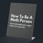 Signe De Table How To Be A Math Person<br><div class="desc">funny, mathematics, math, childrens maths, how to be a math person, math club, math equation, math quotes, mathematician, nerdy math, school, science, math teacher, person, teacher, back to school, cool, funny math, geek, pun, children, education, engineer, first day of school, grades, how, kids, math person, math student, nerdy, numbers, professor,...</div>