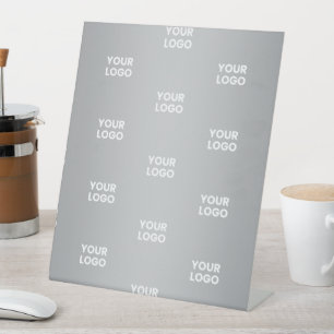 Signe De Table Logos répétitifs sur un dégradé gris (couleur modi