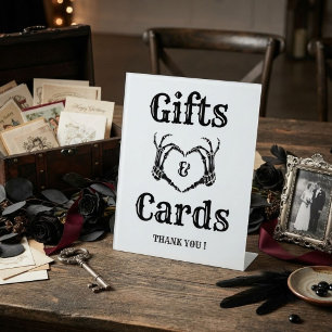 Signe De Table Pancarte de mains de crâne de cadeaux et de cartes