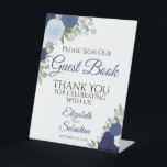 Signe De Table Rustic Blue Boho Floral S'Il Vous Plaît Signer Not<br><div class="desc">Ce magnifique panneau de piédestal fera invitation vos invités mariages à signer votre livre d'or. Il présente un design boho floral rustique avec des roses d'aquarelle peints à la main dans des tons bleu poussiéreux, bleu marine et indigo. Il y a de la place pour les noms du couple ainsi...</div>