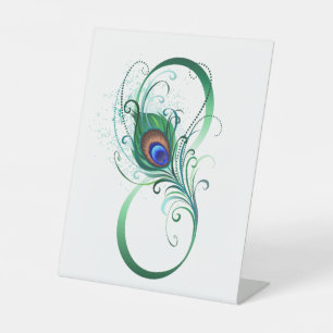 Signe De Table Symbole d'infini avec plume de paon