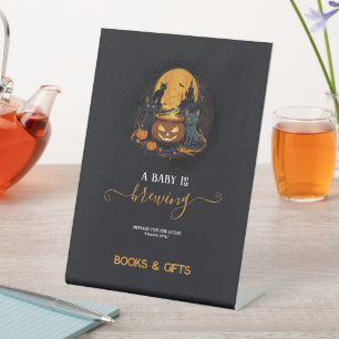 Signe De Table Un bébé brasse de mignons livres de Baby shower d'