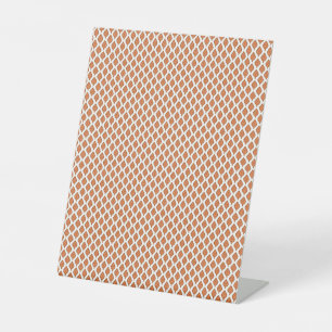 Signe De Table un motif géométrique orange et blanc