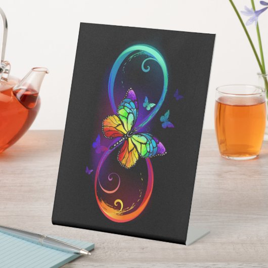 Signe De Table Vibrant infinity with rainbow butterfly on black (In SItu)