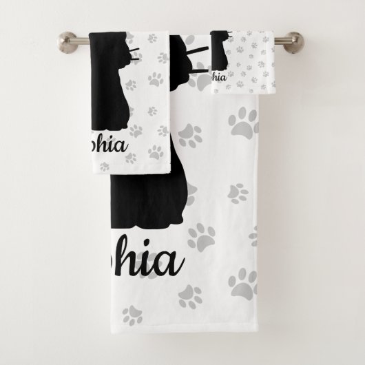 Silhouette de chat noir papillon rose sur la queue (En situation)