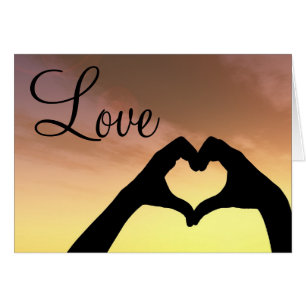 Silhouette en forme de coeur de mains