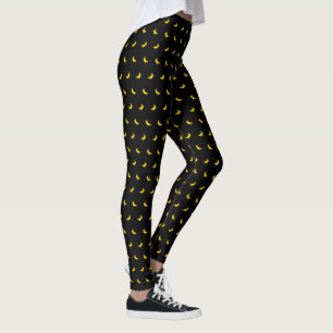 Silhouettes van kleine geelbananen op zwart leggings