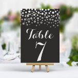 Silver Confetti Élégant Noir Numéro de table<br><div class="desc">Ajoutez une touche de glamour et d'éclat à votre réception de mariage avec ces élégants numéros de table. Dotées d'un arrière - plan noir audacieux et d'une cascade de confettis argentés chatoyants, ces cartes créent un look moderne et chic. Personnalisez facilement vos numéros de table pour un cadre de table...</div>