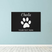 Silver Dog Paw op zwarte achtergrond Canvas Afdruk (Insitu (Houten vloer))